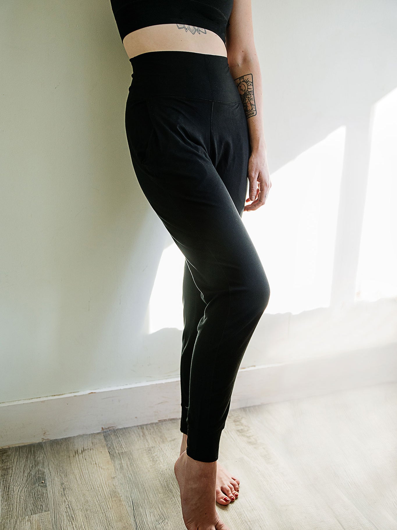 jogger sweatpant in black paired with black balance bra