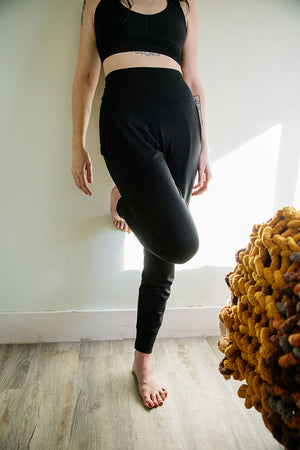 jogger sweatpant in black paired with black balance bra