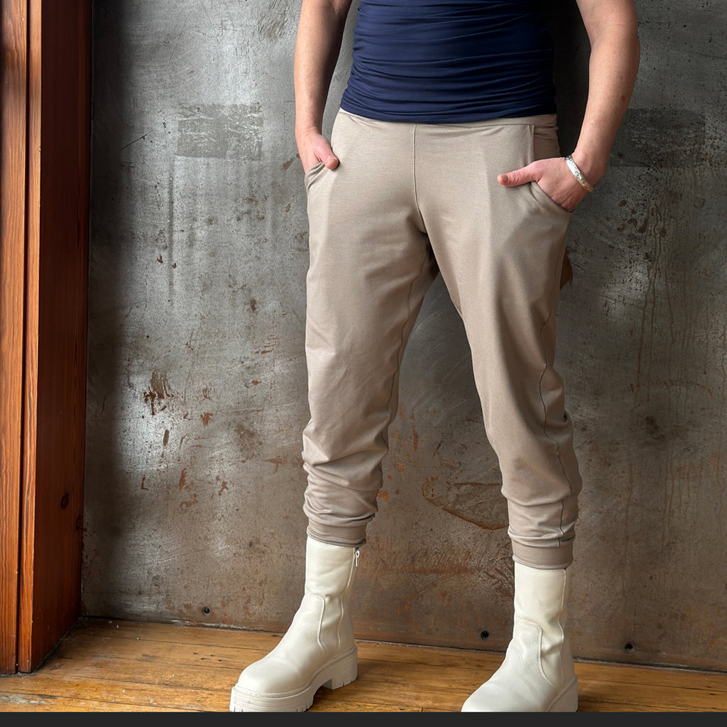 suger® jogger sweat pant in clay styled with navy wifey