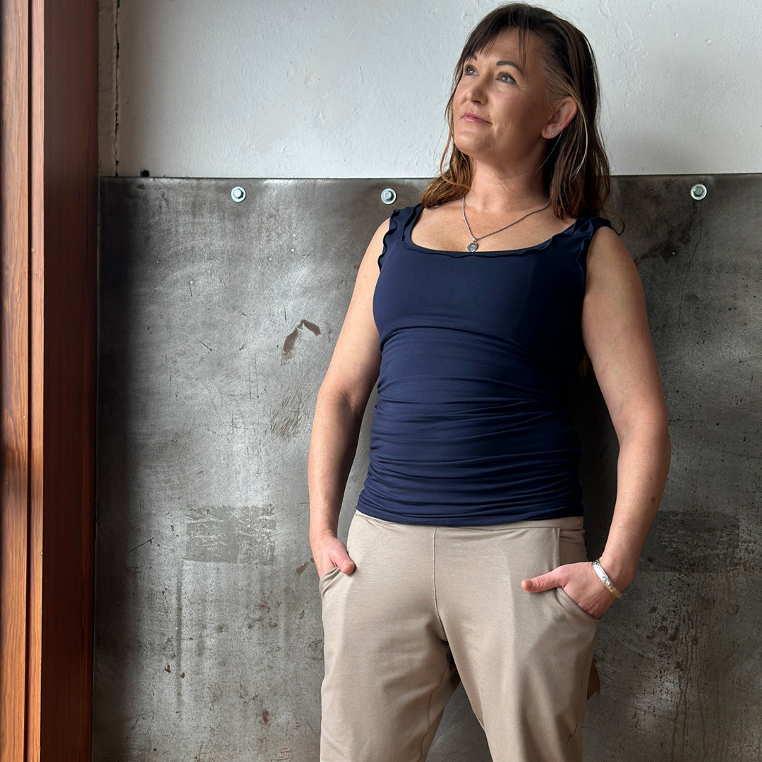 suger® jogger sweat pant in clay styled with navy wifey