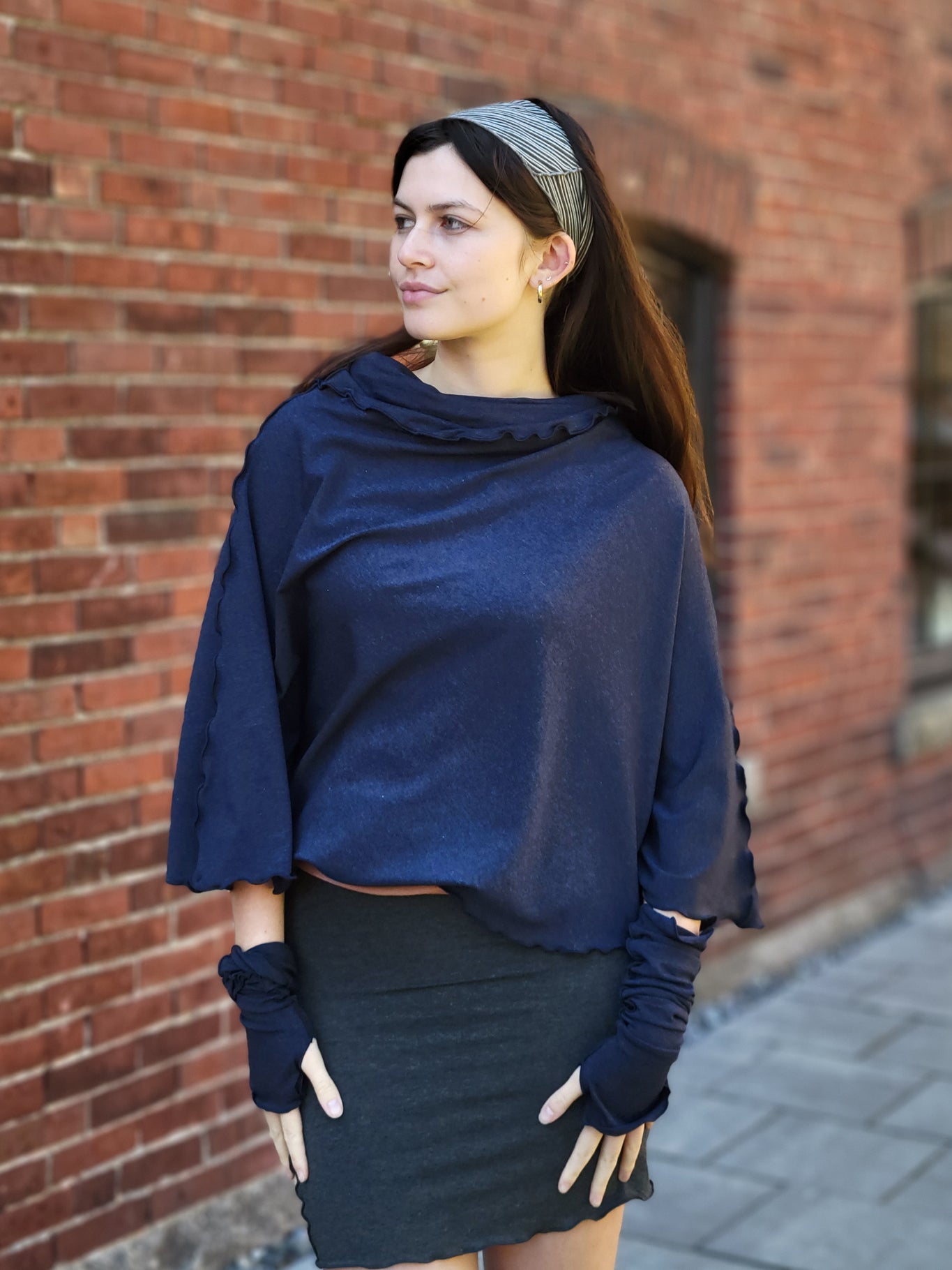 lady flirt in midnight worn as poncho with charcoal hourglass