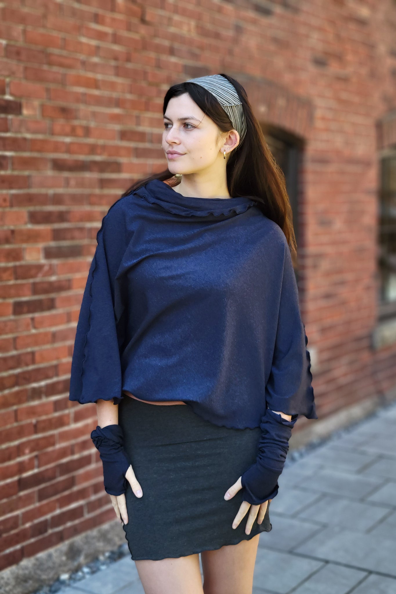 lady flirt in midnight worn as poncho with charcoal hourglass