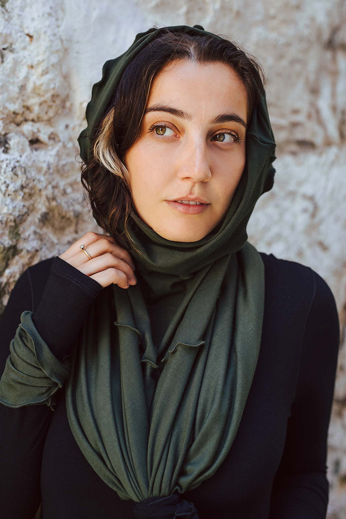 flirt worn as a hooded scarf in fir