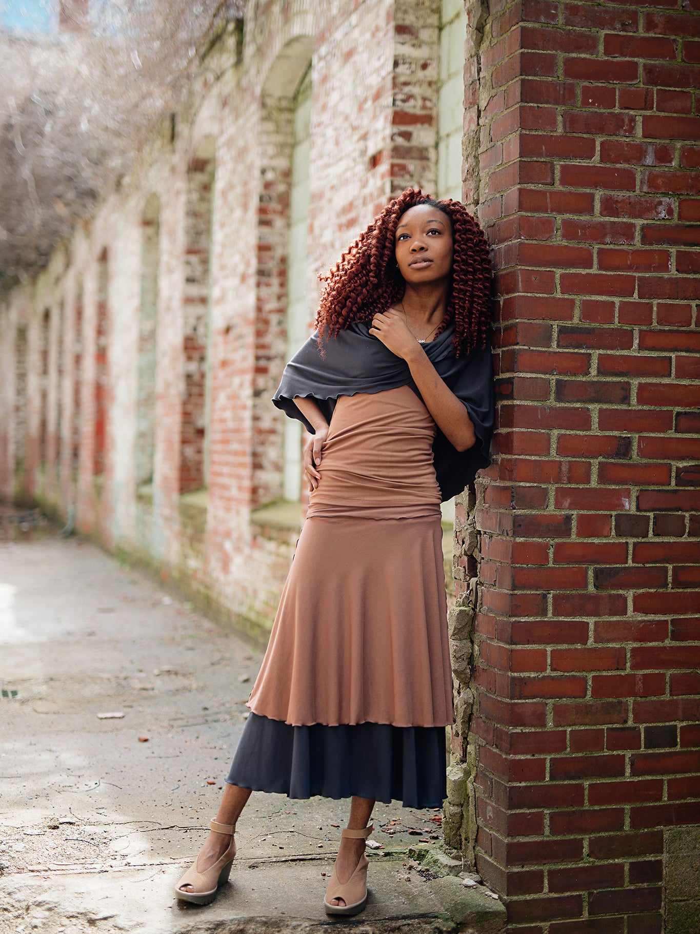 layered lady flirts in carbon and cedar, paired with core tank in cedar and loop in carbon worn as a shawl