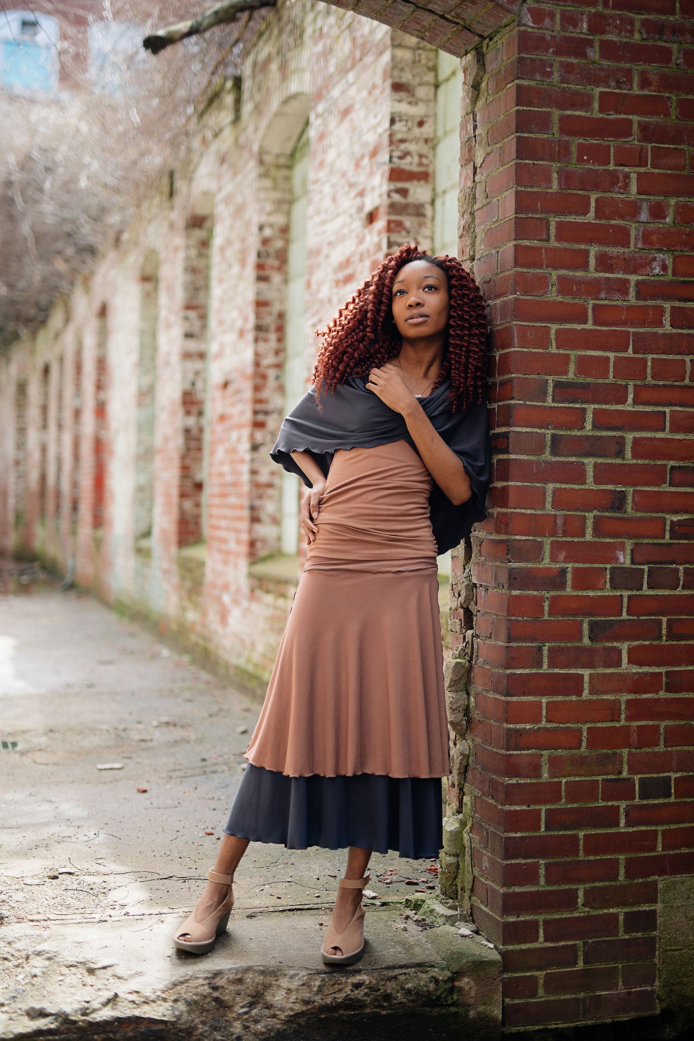 layered lady flirts in carbon and cedar, paired with core tank in cedar and loop in carbon worn as a shawl