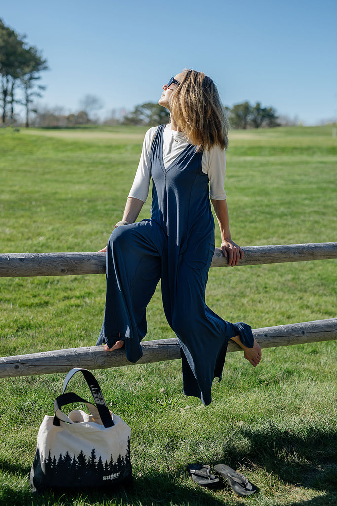suger® farmer jumpsuit in ocean styled with white rose shirt