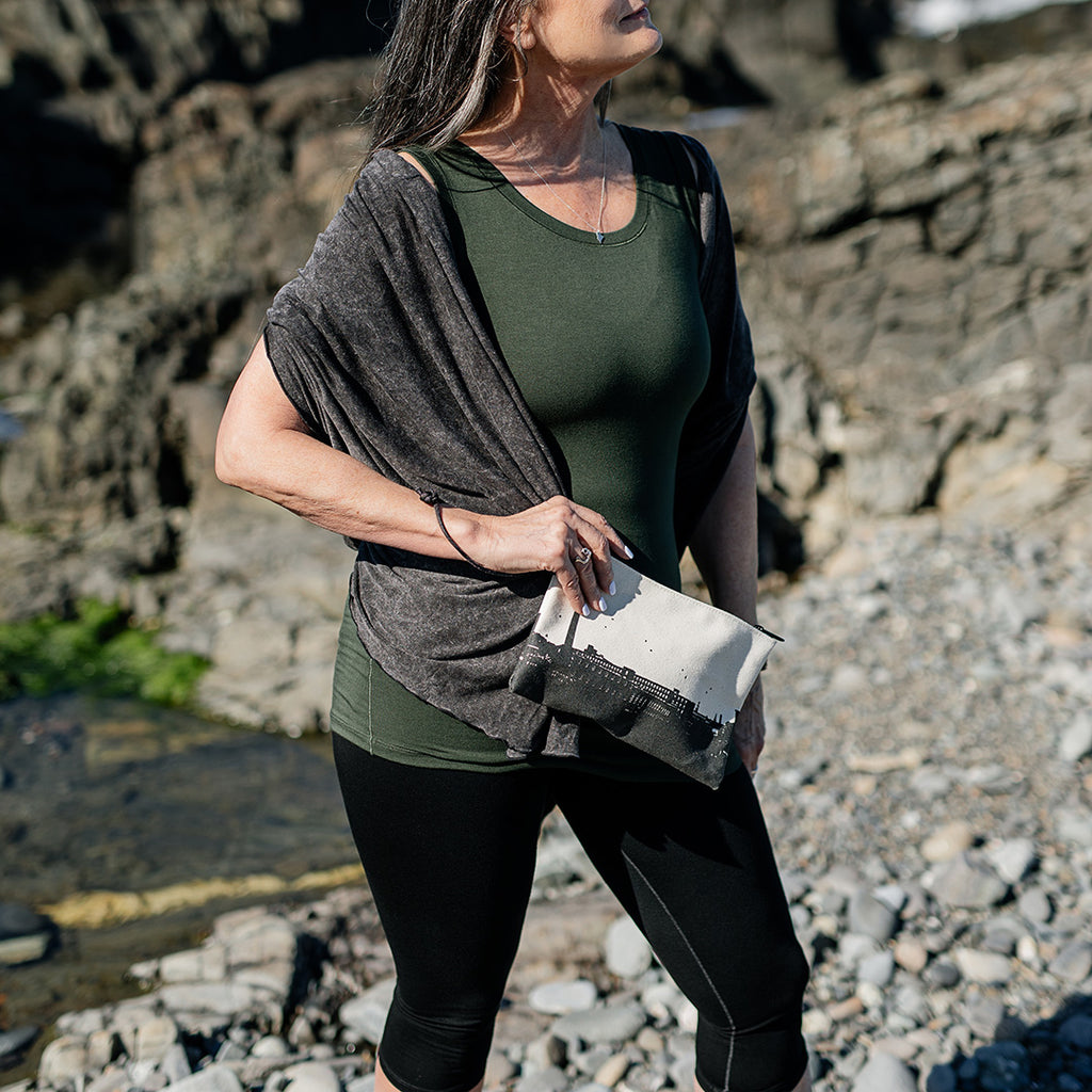 core essential tank in fir styled with mineral shawl + black capri + mill clutch