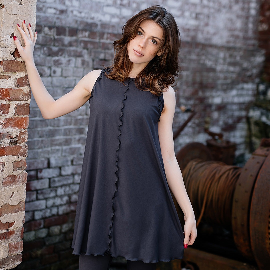shift tunic tank in carbon over capri base legging in carbon