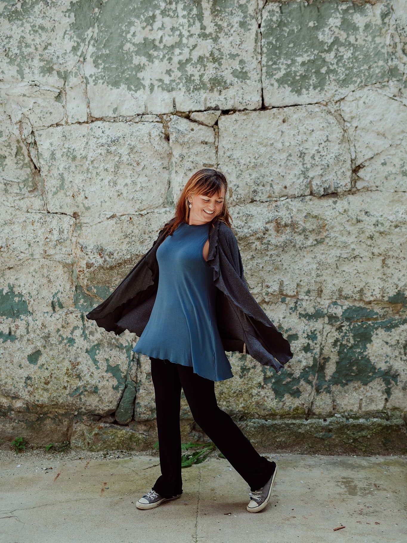 suger trouser in black with daisy tank in ocean and river jacket in charcoal