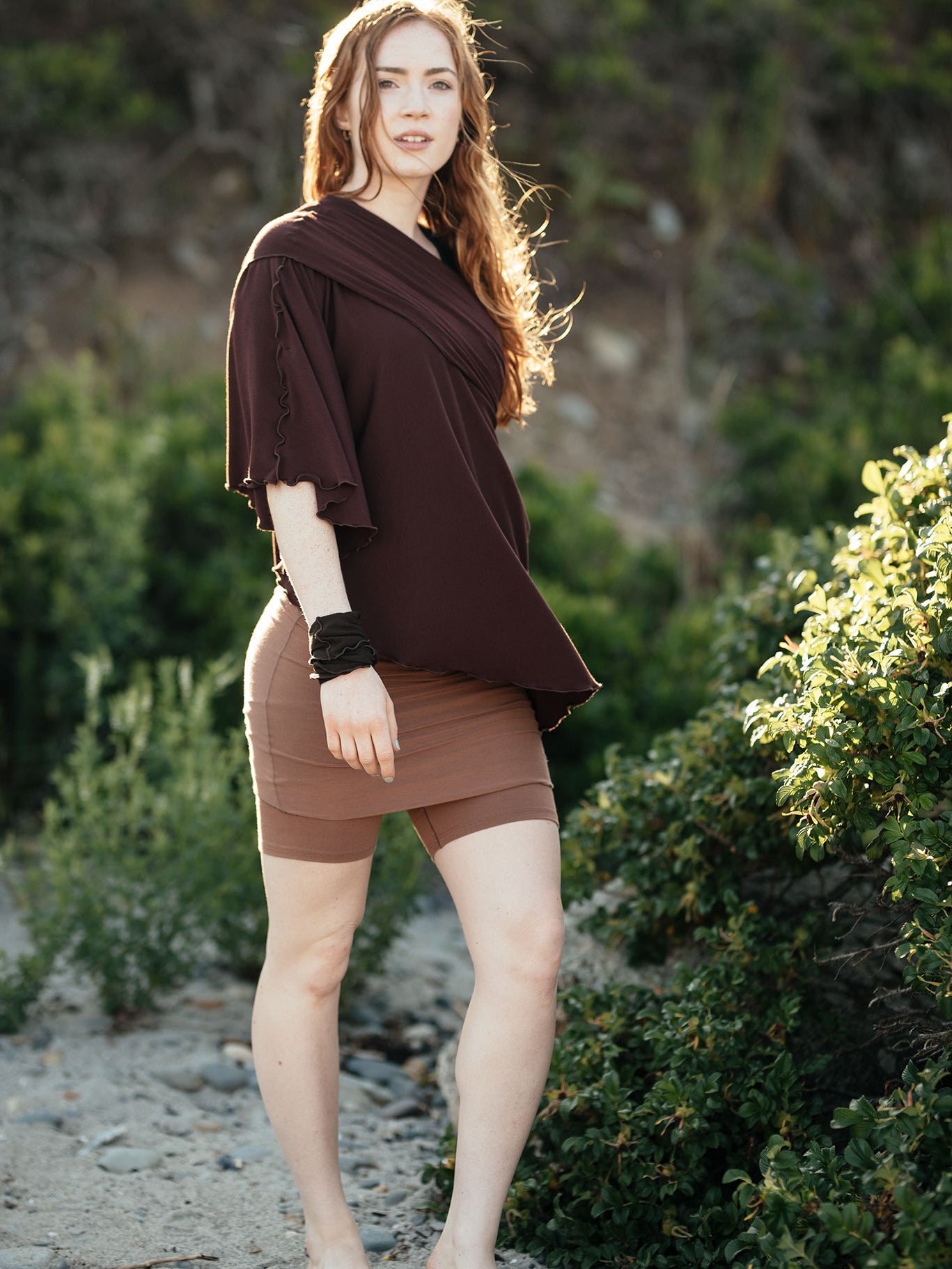 hiker convertible short in cedar with flirt in wine as a poncho
