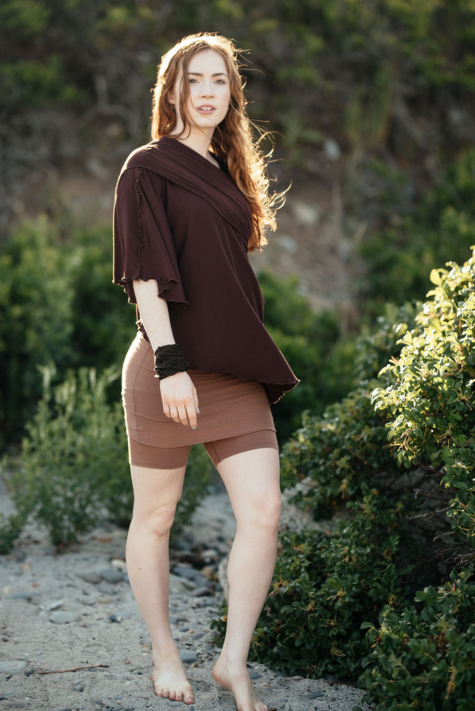 hiker convertible short in cedar with flirt in wine as a poncho