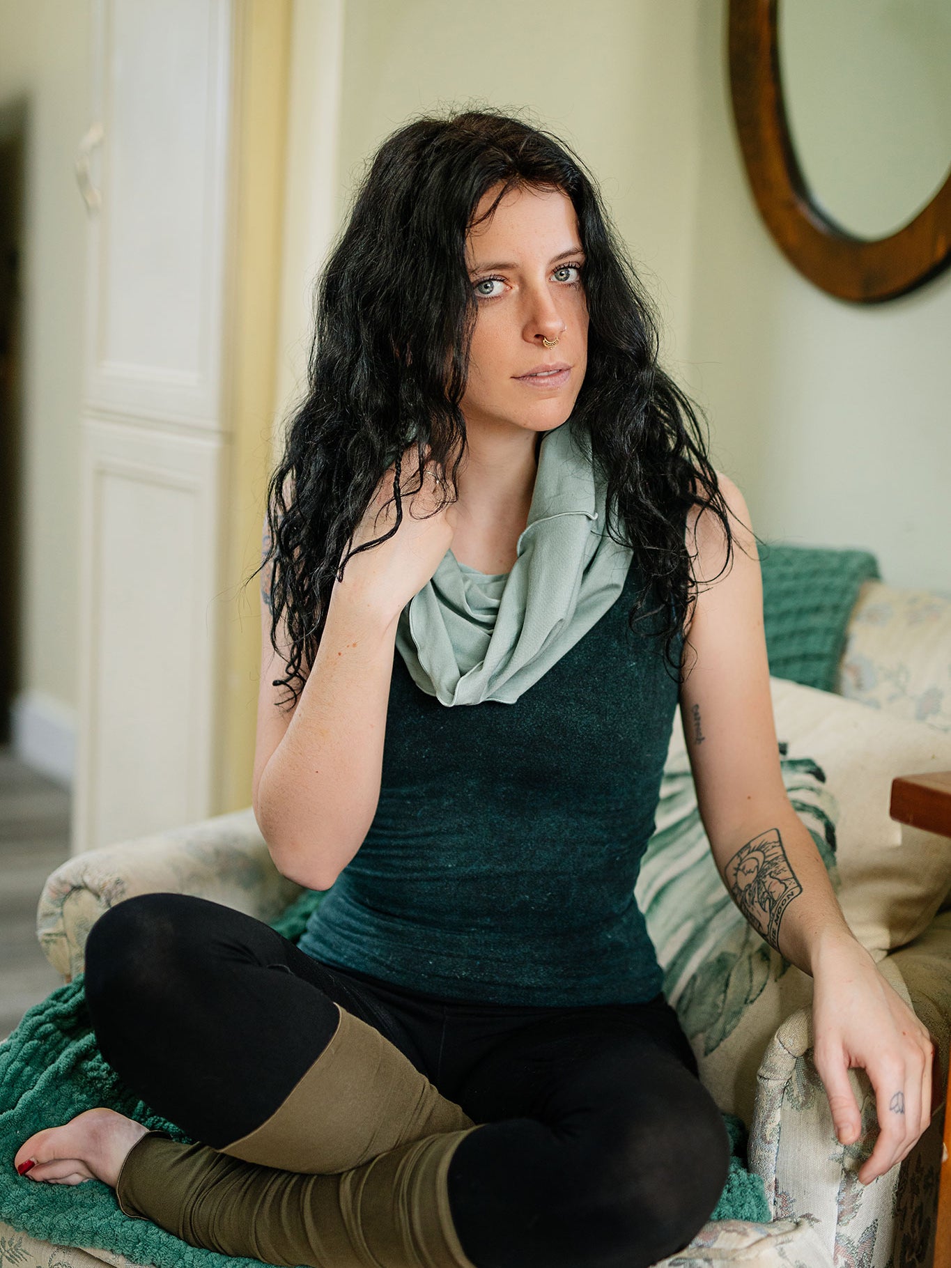 core tank in blue mineral with hourglass in glass, base legging in black, and olive stockings