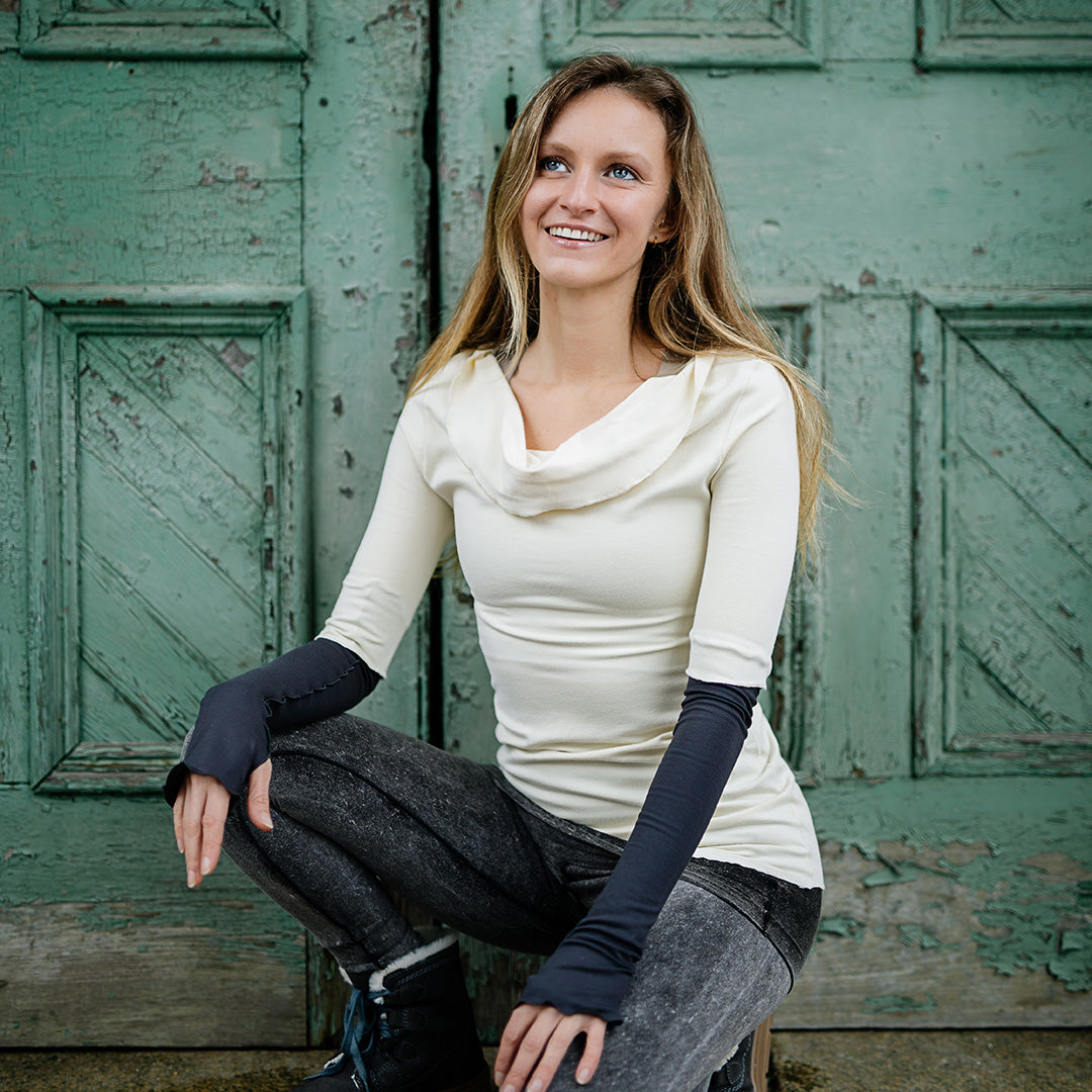 grace cowl neck top in milk with carbon opera sleeves and mineral playsuit