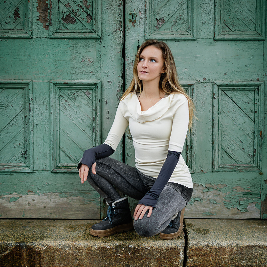 grace cowl neck top in milk with carbon opera sleeves and mineral playsuit