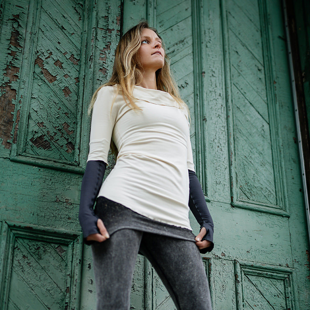 grace cowl neck top in milk with carbon opera sleeves and mineral playsuit