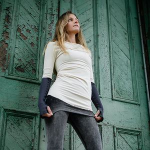 grace cowl neck top in milk with carbon opera sleeves and mineral playsuit