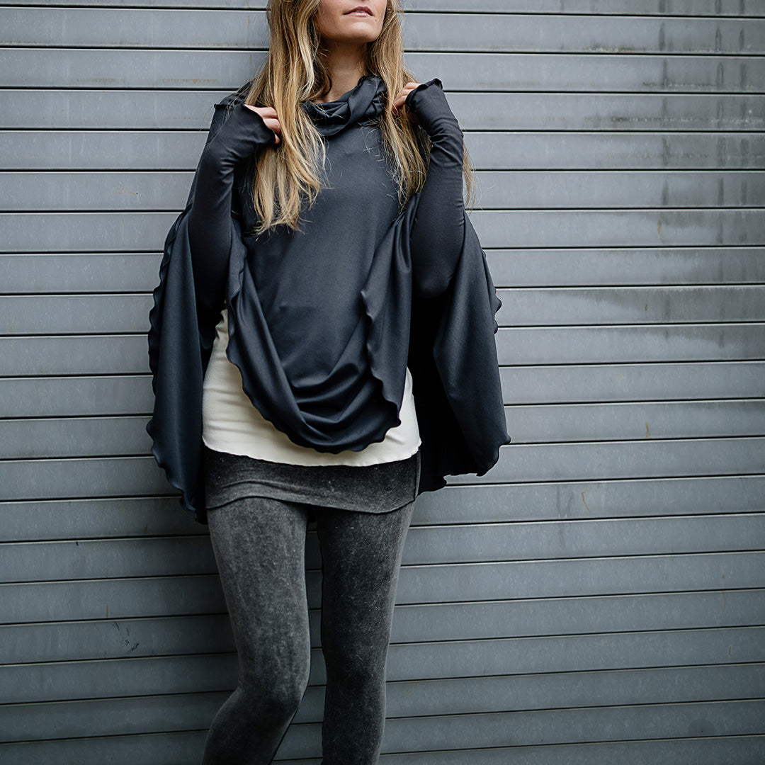 lady flirt in carbon as a poncho with carbon opera sleeves and playsuit in mineral