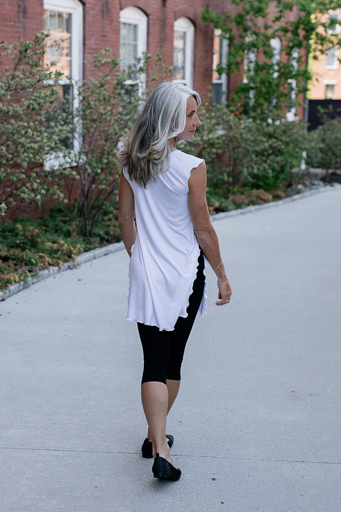 doublet layer top in white paired with black capri