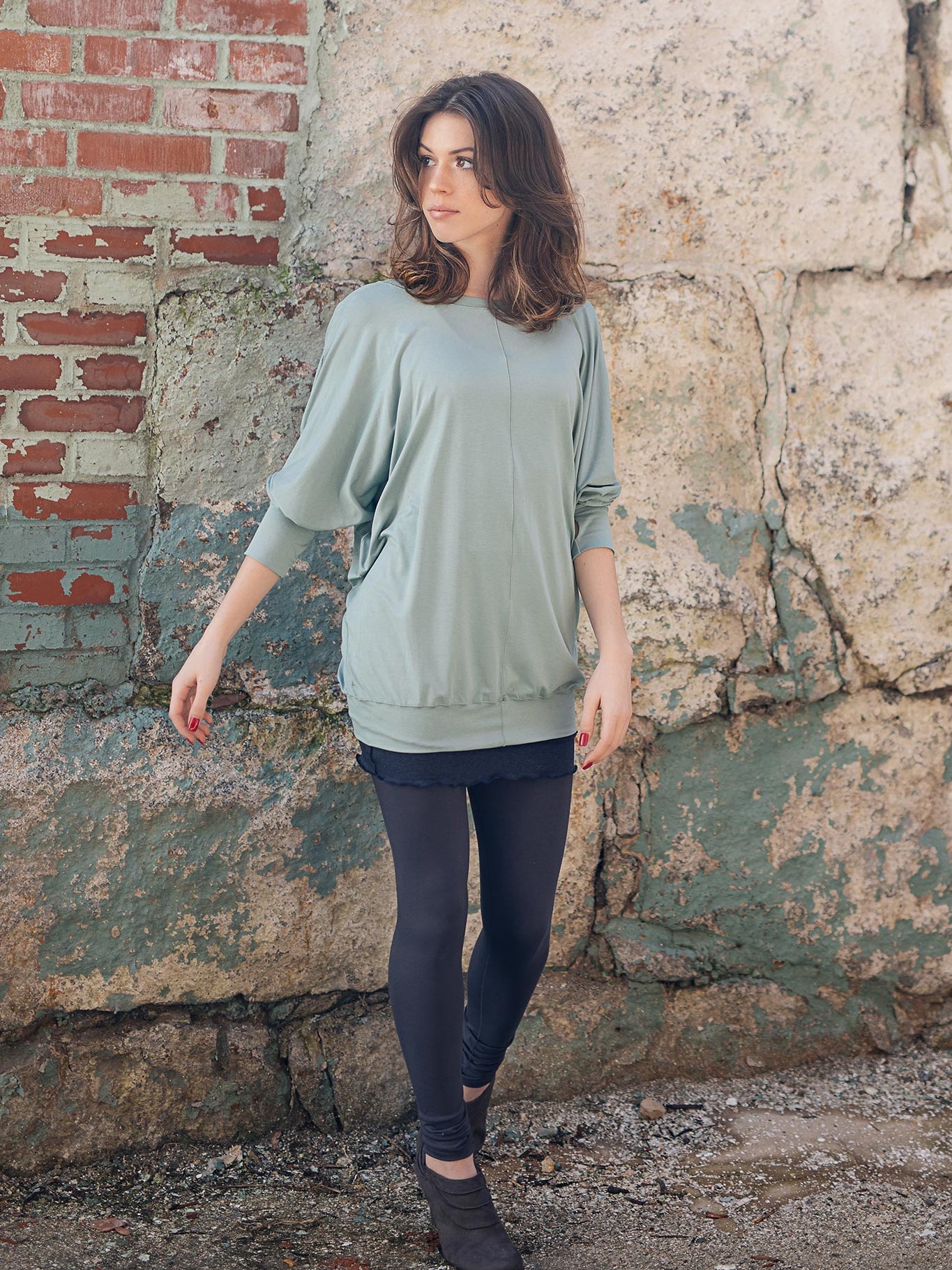 base legging in carbon paired with pop top in glass and hourglass in midnight worn as a skirt