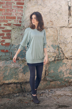 base legging in carbon paired with pop top in glass and hourglass in midnight worn as a skirt