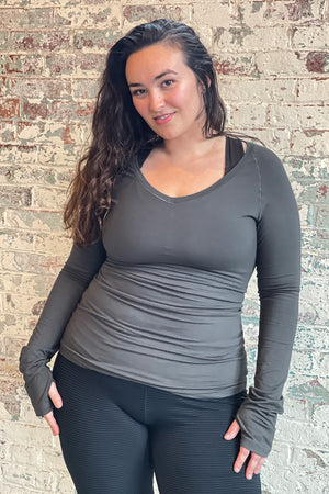 bamboo fir vneck long sleeve top with subtle black base leggings and balance bra