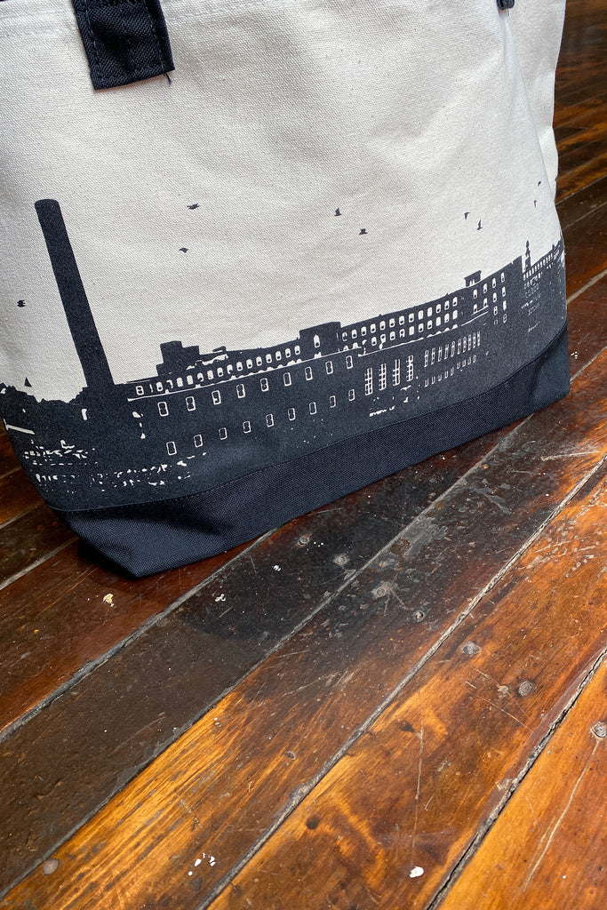 tote bag with the mill design on them
