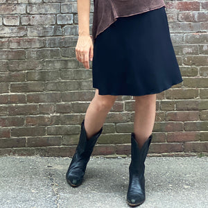 suger® flip skirt in black paired with reef mineral true pearl