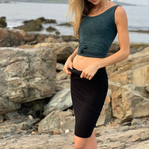 hourglass in black worn as a long skirt paired with the tulip top in blue mineral