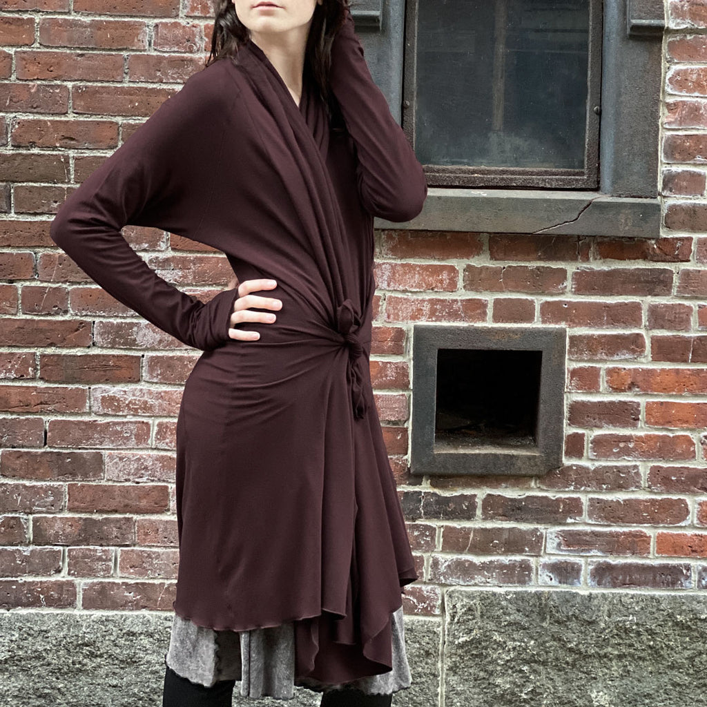 riding coat in wine tied at the waist with versatile pockets