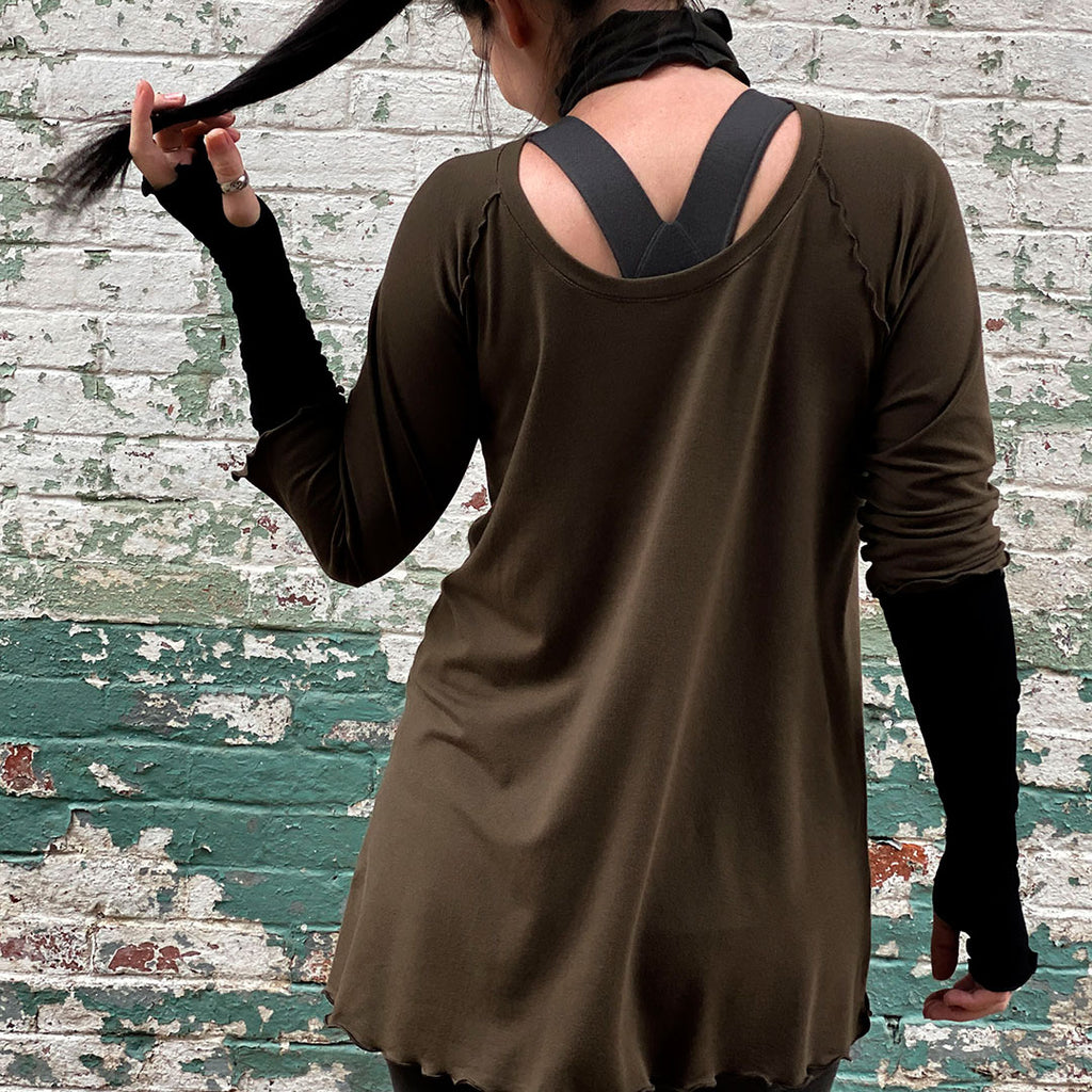 swing tunic top in olive with black balance bra, opera sleeves, + band