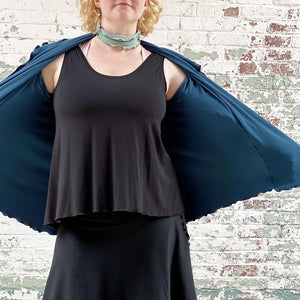 tulip tissue tank in black with flirt as a skirt in subtle black and trench jacket in lake