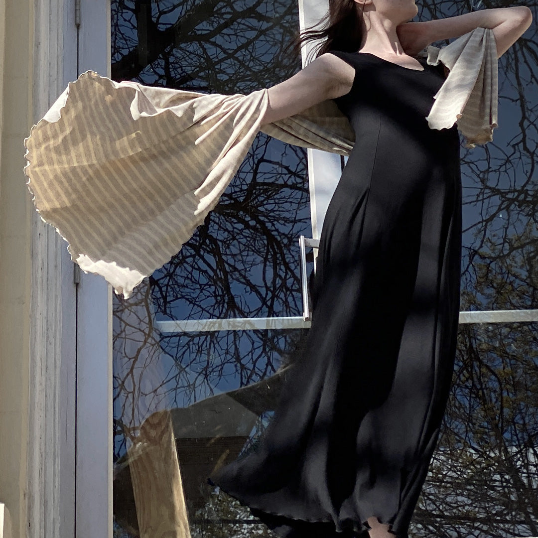 glow gown in black with dune shawl