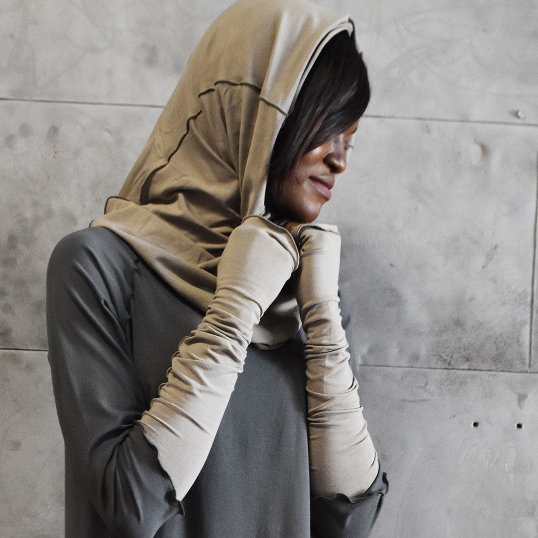 clay opera sleeves and hourglass hooded cowl are simply elegant paired with iron swing tunic