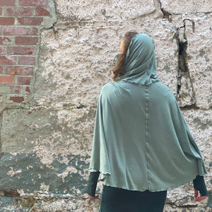 glass lady flirt as a hooded poncho