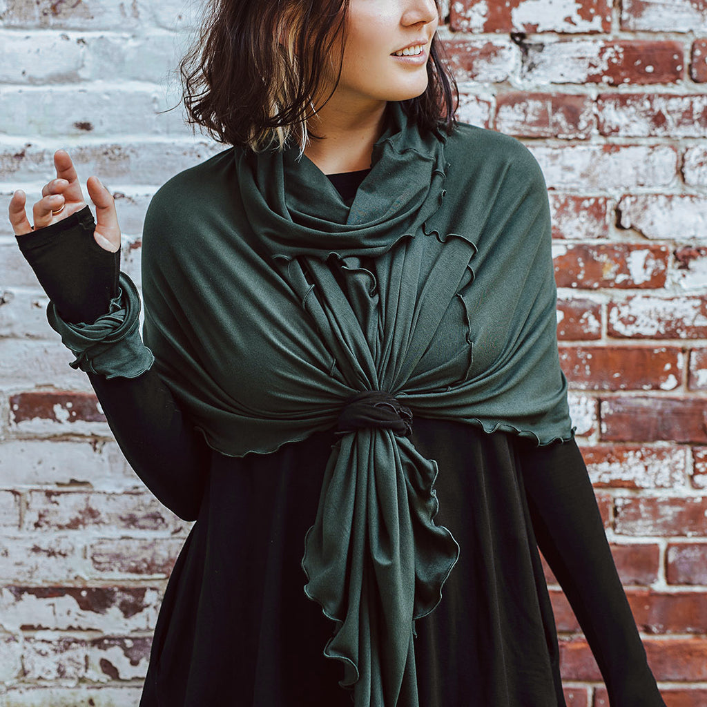 flirt worn as a fitted poncho in fir