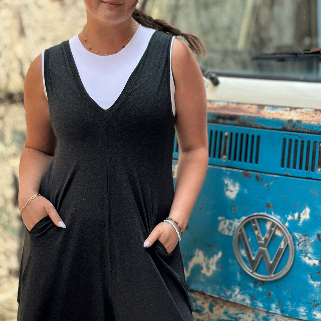 suger® farmer jumpsuit in lava with white hug underneath 