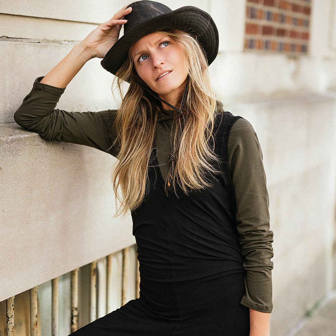 scuba hooded ski tunic in olive under black farmer jumpsuit