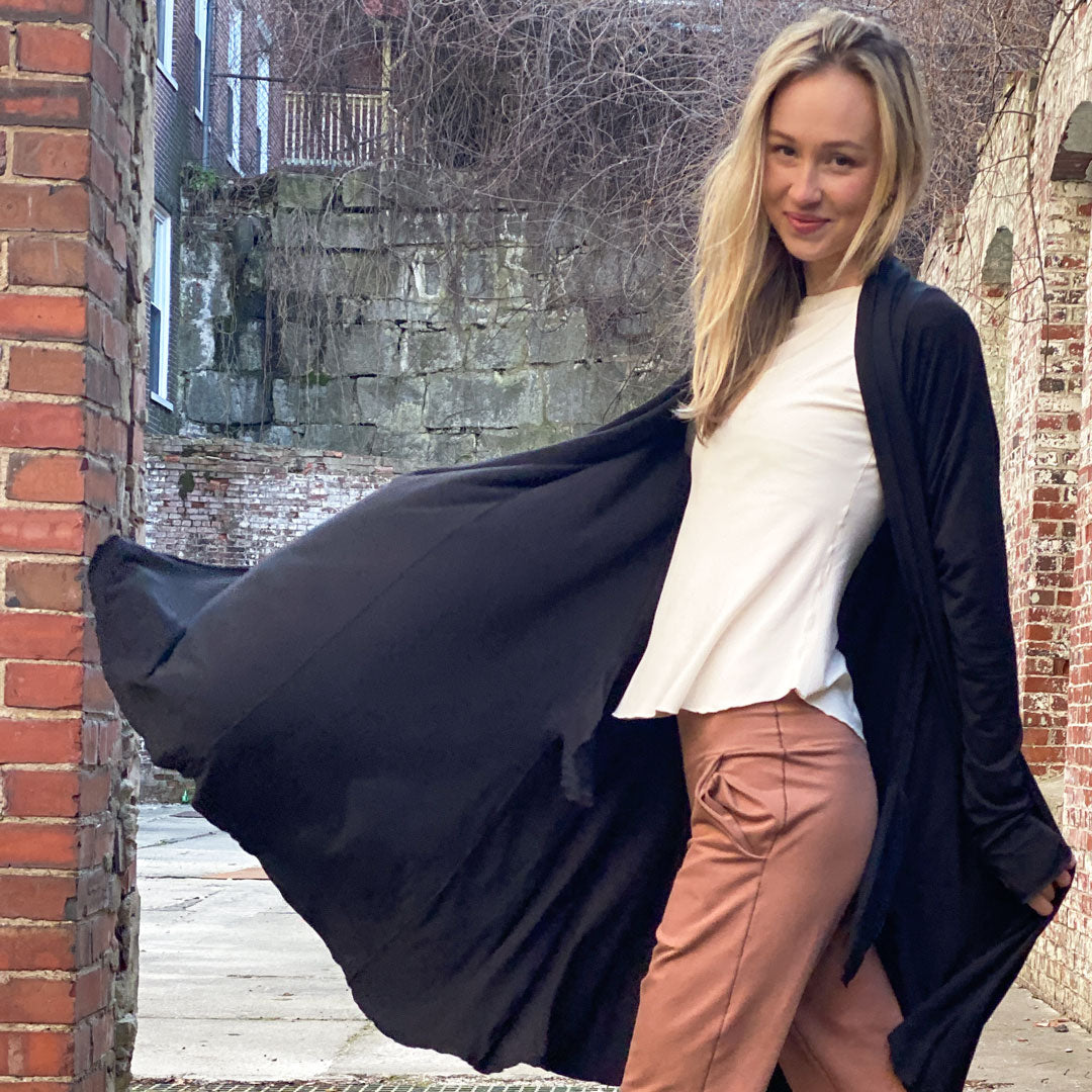 garden coat in black over rose top in milk and jogger in cedar