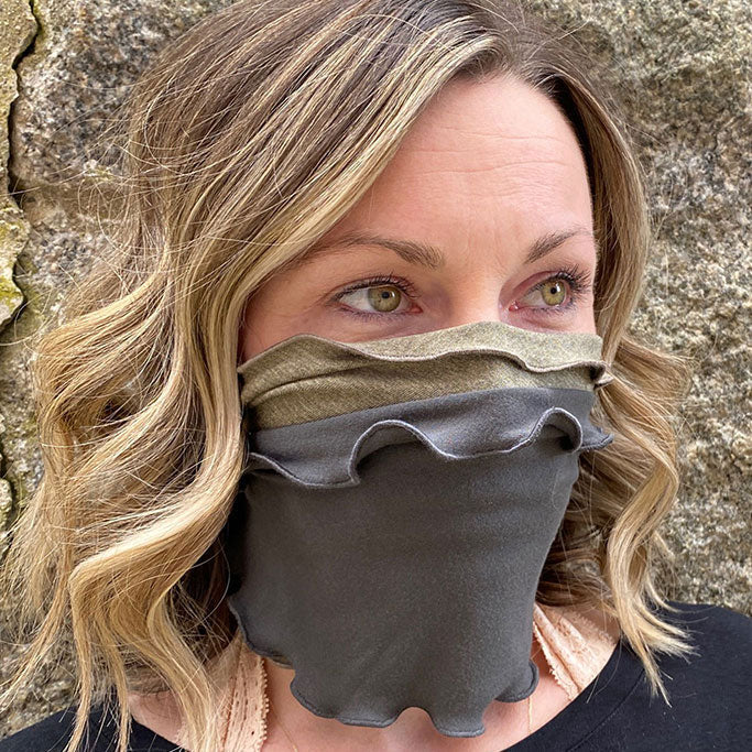 layered bands as face cover, shown in sand and ore