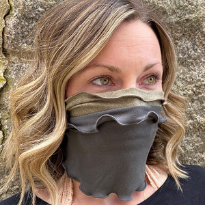 layered bands as face cover, shown in sand and ore