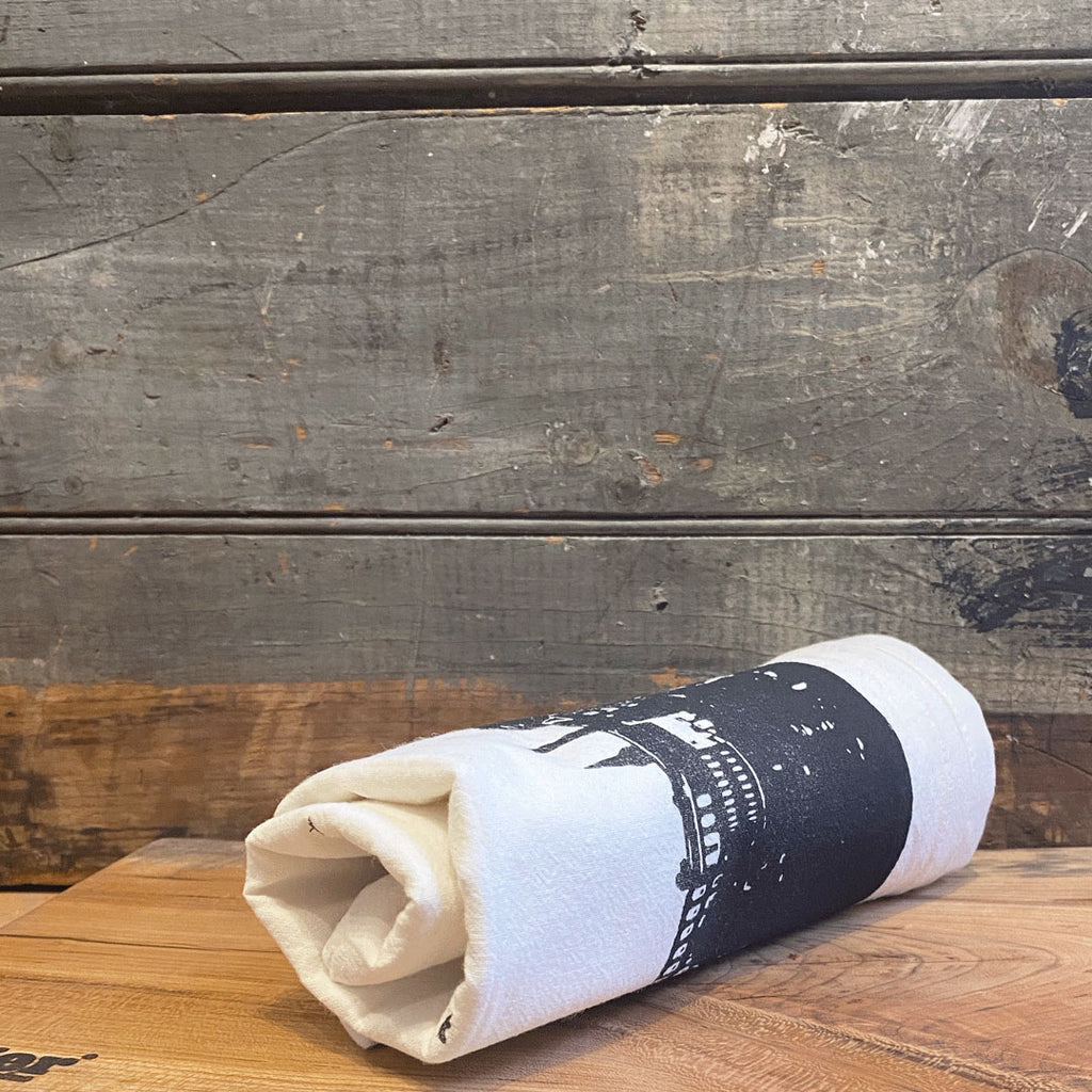 mill tea towel rolled up
