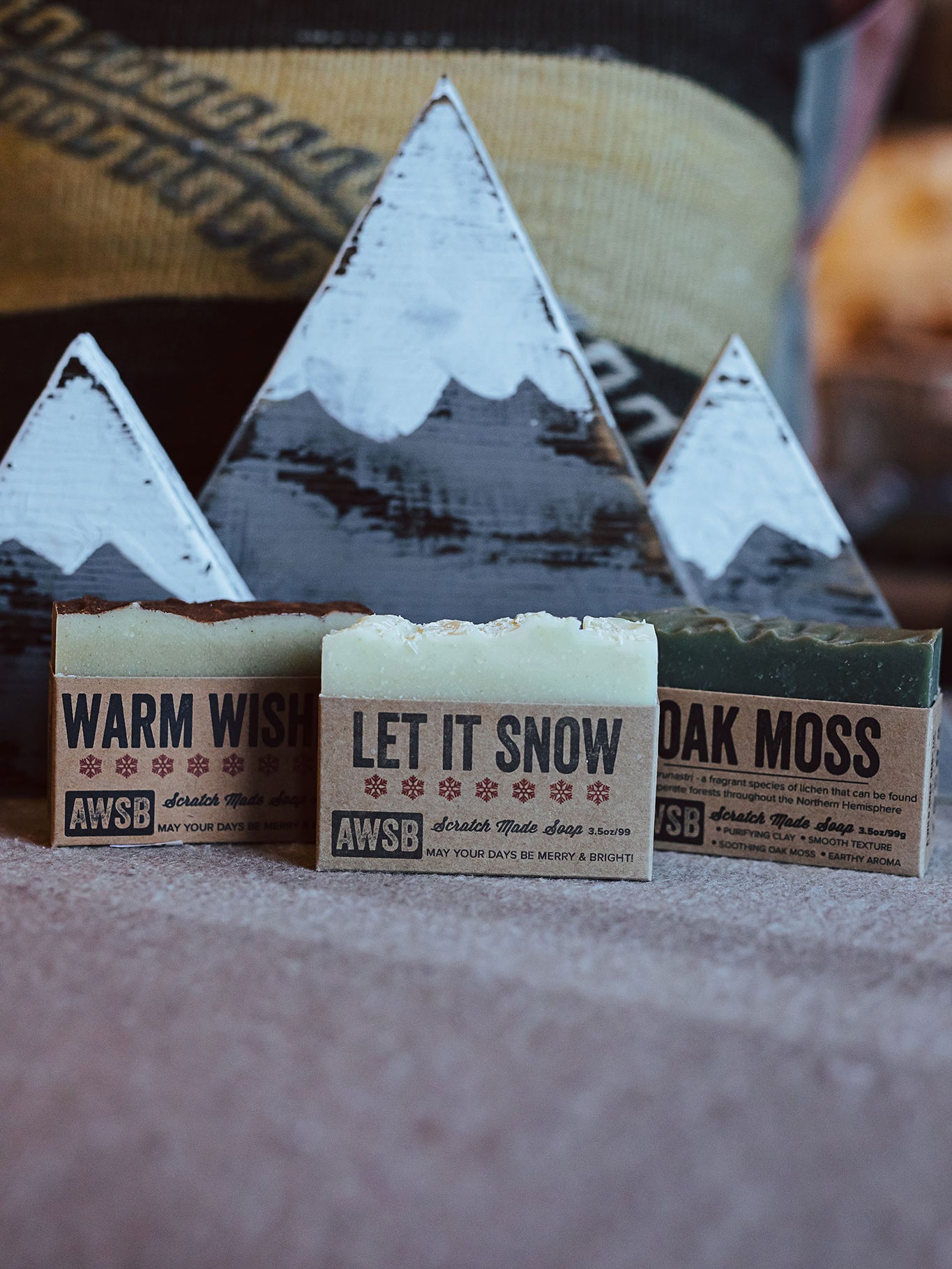 good soap in three scents, warm wishes, let it snow, and oak moss